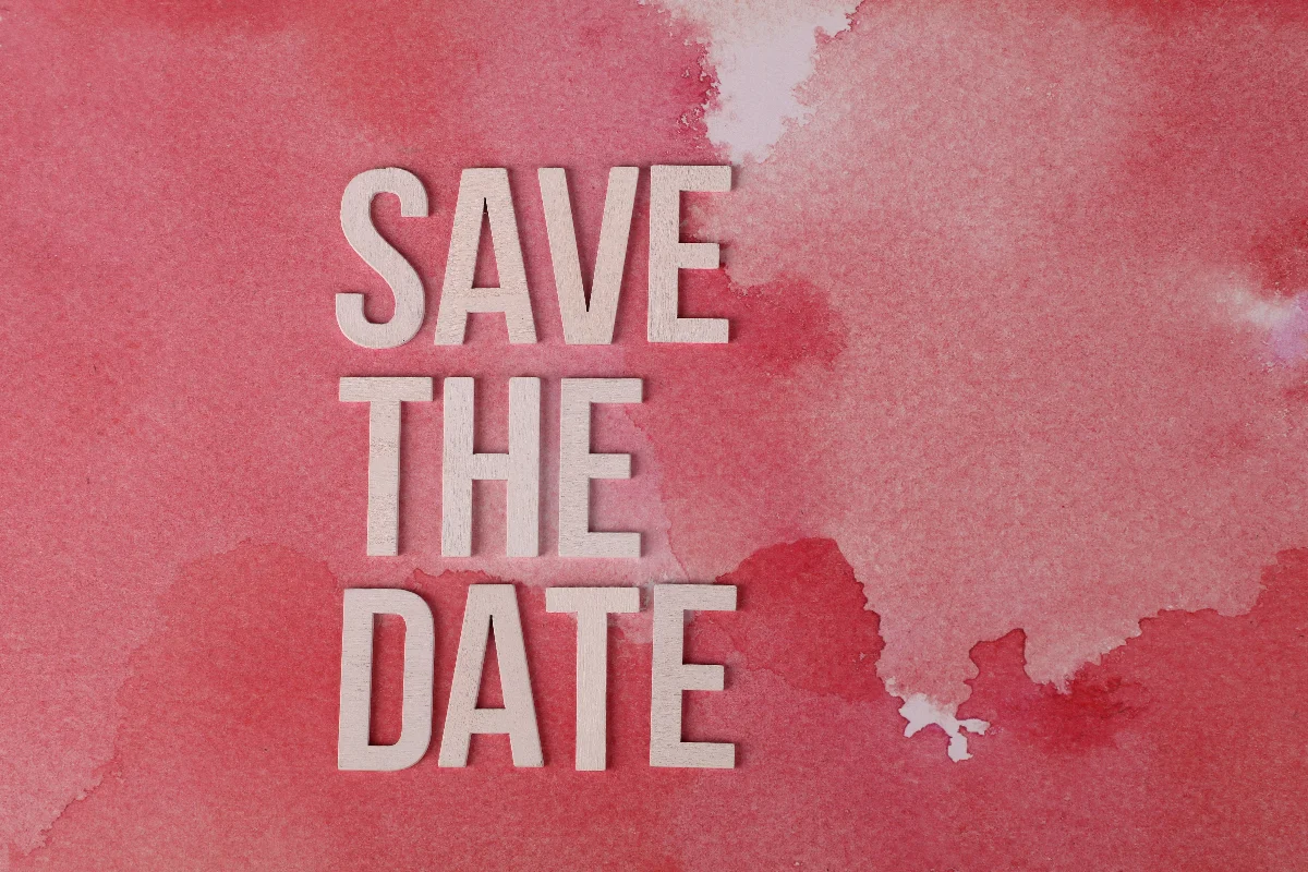 Elegant pink watercolor background with 'Save the Date' text for invitations.